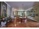 Open living and dining space with hardwood floors at 6470 Meridian Pkwy # Apt D, Indianapolis, IN 46220