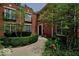 Brick home with landscaped walkway and lush greenery at 6470 Meridian Pkwy # Apt D, Indianapolis, IN 46220