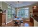 Breakfast nook with hardwood floors and a view to the garden at 6470 Meridian Pkwy # Apt D, Indianapolis, IN 46220