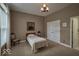 Charming bedroom with neutral walls and ample closet space at 6470 Meridian Pkwy # Apt D, Indianapolis, IN 46220