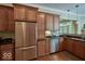 Modern kitchen with stainless steel appliances and granite countertops at 6470 Meridian Pkwy # Apt D, Indianapolis, IN 46220