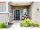 Brick front porch with seating area at 16311 Taconite Dr, Noblesville, IN 46060