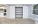 Walk-in pantry with white barn doors and ample shelving at 6235 Johnson Rd, Indianapolis, IN 46220