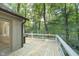 Wooden deck overlooking a wooded area at 6235 Johnson Rd, Indianapolis, IN 46220