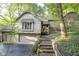 Two-story home with brick and siding exterior, and a two car garage at 6235 Johnson Rd, Indianapolis, IN 46220