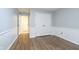 Bedroom with wood-look flooring, access to a bathroom and closet at 6235 Johnson Rd, Indianapolis, IN 46220