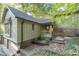 Brick and wood exterior home with landscaping and a walkway at 6235 Johnson Rd, Indianapolis, IN 46220