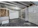 Unfinished basement with built-in wine rack at 6235 Johnson Rd, Indianapolis, IN 46220