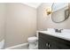 Modern bathroom with updated vanity and oval mirror at 6235 Johnson Rd, Indianapolis, IN 46220