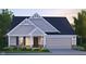 Craftsman style home with neutral siding and two-car garage at 11802 Adair Pl, Indianapolis, IN 46229