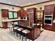 Gourmet kitchen with granite countertops and stainless steel appliances at 5300 W Autumn Springs Ct, Muncie, IN 47304