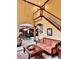 Open living room with high ceilings and a view to the kitchen at 5300 W Autumn Springs Ct, Muncie, IN 47304