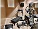 Basement gym with a treadmill, elliptical, and other exercise equipment at 5300 W Autumn Springs Ct, Muncie, IN 47304