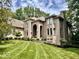 Large brick house with landscaped yard at 5300 W Autumn Springs Ct, Muncie, IN 47304