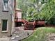 Multi-level deck with stone pathway to yard at 5300 W Autumn Springs Ct, Muncie, IN 47304