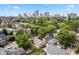 Aerial view showcasing home and surrounding neighborhood, with city skyline in the background at 646 E 9Th St, Indianapolis, IN 46202