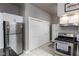 Kitchen with stainless steel appliances and ample cabinet storage at 646 E 9Th St, Indianapolis, IN 46202