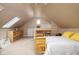 Spacious attic bedroom with skylights and built-in storage at 646 E 9Th St, Indianapolis, IN 46202