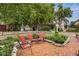 Brick patio with seating area and lush landscaping at 646 E 9Th St, Indianapolis, IN 46202