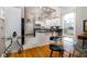 Modern kitchen featuring granite countertops and stainless steel appliances at 646 E 9Th St, Indianapolis, IN 46202