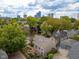 Aerial view of a house and surrounding neighborhood with city skyline in the background at 646 E 9Th St, Indianapolis, IN 46202