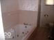 Bathroom with bathtub, shower, and toilet at 4013 N Audubon Rd, Indianapolis, IN 46226