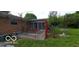 Brick patio with picnic table and bird bath at 4013 N Audubon Rd, Indianapolis, IN 46226