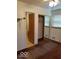 Bedroom with mirrored closet and carpet at 4013 N Audubon Rd, Indianapolis, IN 46226