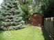 Backyard with shed and large tree at 4013 N Audubon Rd, Indianapolis, IN 46226