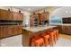 Modern kitchen with stainless steel appliances, granite countertops, and an island with seating at 5181 S Poplar Dr, Columbus, IN 47201