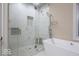 Large walk-in shower with marble tile and built-in seat at 5181 S Poplar Dr, Columbus, IN 47201
