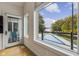 Main bedroom with stunning view of the lake and pool at 5181 S Poplar Dr, Columbus, IN 47201