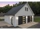Detached two-car garage with modern dark-framed windows at 5181 S Poplar Dr, Columbus, IN 47201