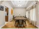 Bright dining room features hardwood floors and large windows at 5181 S Poplar Dr, Columbus, IN 47201