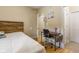 Bedroom with a comfy bed, desk and chair, and hardwood floors at 5181 S Poplar Dr, Columbus, IN 47201