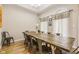 Farmhouse style dining room with long wooden table and metal chairs at 5181 S Poplar Dr, Columbus, IN 47201