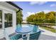 Deck with lake view and seating area overlooking the pool at 5181 S Poplar Dr, Columbus, IN 47201