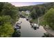 Aerial view of lakefront property with boats and homes at 5181 S Poplar Dr, Columbus, IN 47201