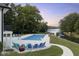 Inviting rectangular pool with lake view and lounge chairs at 5181 S Poplar Dr, Columbus, IN 47201