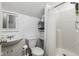 Clean bathroom with shower, sink, and toilet at 5181 S Poplar Dr, Columbus, IN 47201