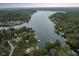 Wide shot of lake community with lush trees and homes at 5181 S Poplar Dr, Columbus, IN 47201