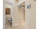Hallway with tile floors and access to a bathroom at 5181 S Poplar Dr, Columbus, IN 47201