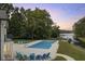 Relax by the pool and enjoy breathtaking sunset views over the lake at 5181 S Poplar Dr, Columbus, IN 47201