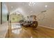 Spacious living room with hardwood floors, vaulted ceilings, and a comfortable seating area at 5181 S Poplar Dr, Columbus, IN 47201