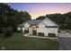 White brick home with gray roof and lush green lawn at 5181 S Poplar Dr, Columbus, IN 47201