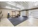 Well-equipped garage gym featuring weight rack and flooring at 5181 S Poplar Dr, Columbus, IN 47201