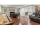 Basement recreation area featuring shuffleboard, seating, and game tables at 5181 S Poplar Dr, Columbus, IN 47201