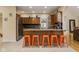 Modern kitchen with stainless steel appliances, granite countertops, and an island with seating at 5181 S Poplar Dr, Columbus, IN 47201