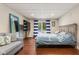Basement bedroom with a comfortable bed and lake view at 5181 S Poplar Dr, Columbus, IN 47201