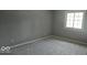 Simple bedroom with neutral decor at 2145 Boston Ct # B, Indianapolis, IN 46228